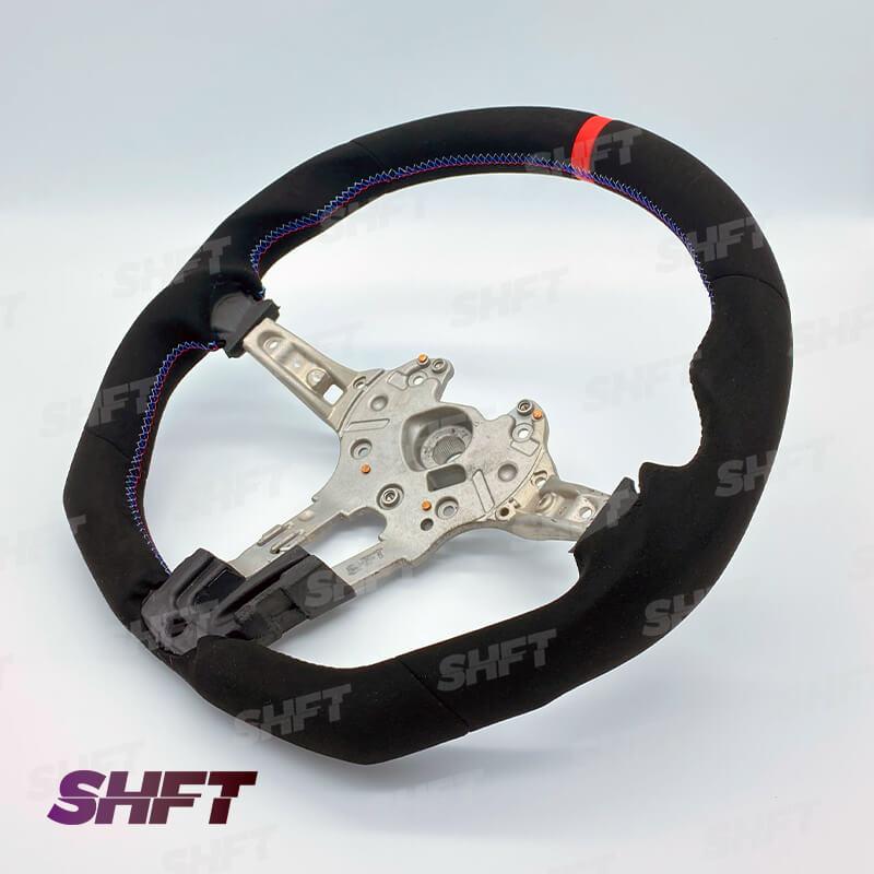 R44 BMW FLAT BOTTOM STEERING WHEEL IN ALCANTARA WITH MOLDED GRIPS AND RED STRIPE