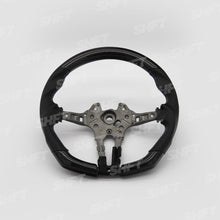 Load image into Gallery viewer, R44 BMW FLAT BOTTOM GLOSS CARBON STEERING WHEEL W/ PERFORATED LEATHER MOLDED GRIPS